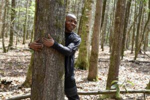 Ghanaian man sets Guinness World Record for Most Trees Hugged in One Hour